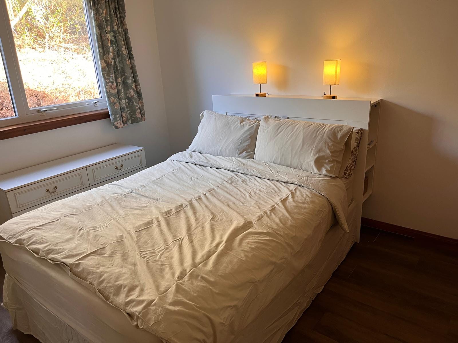 Double Bedroom 2 at Barra Woodview — angled view of the bed and headboard shelf