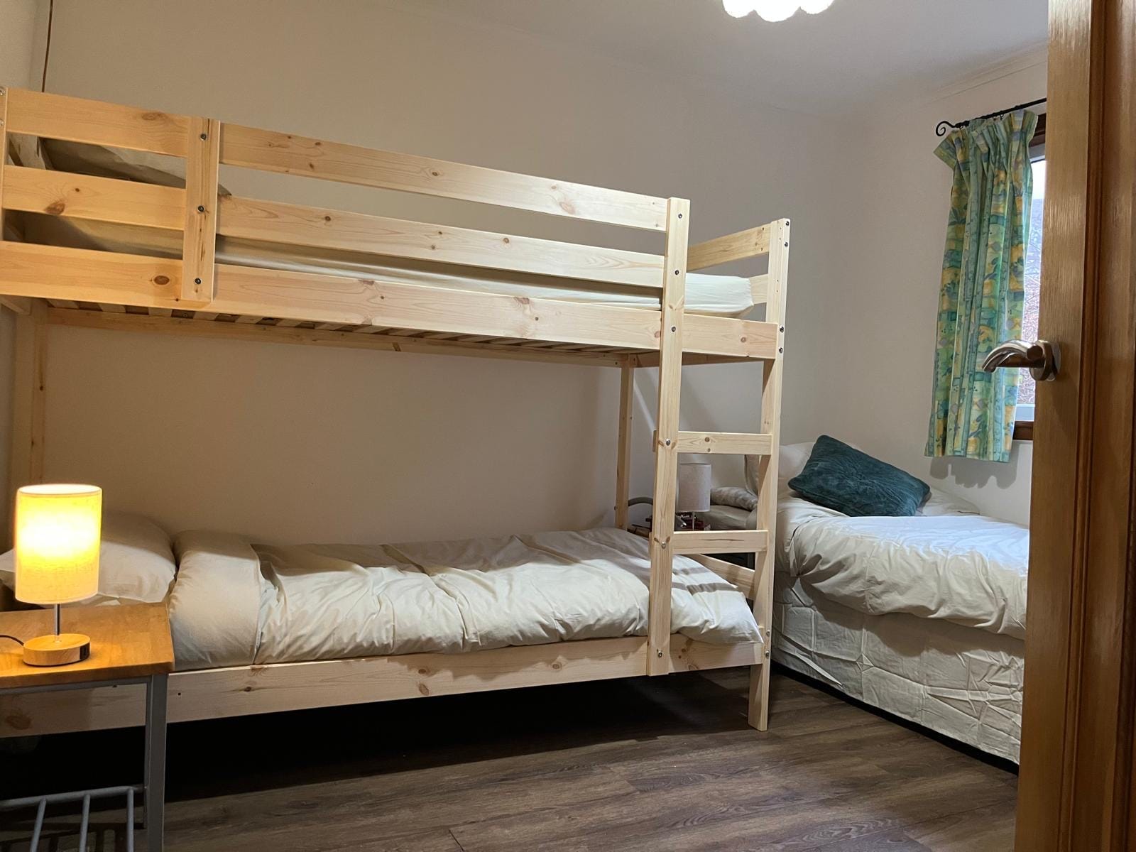 Triple room at Barra Woodview — pine bunk bed with a single bed alongside